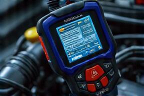 Diagnostic tool connected to car engine